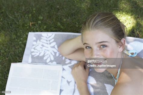 53,436 Young Girl Sunbathing Stock Photos